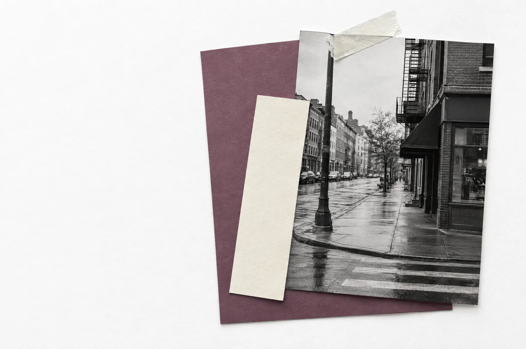 Photographic fragments and aubergine paper from the journal's editorial desk